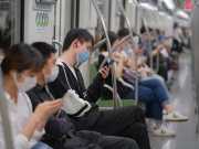 Shanghai/China, Covid-19 precautions, May 2020: Passengers in subway (Source: Robert Way/Shutterstock.com)