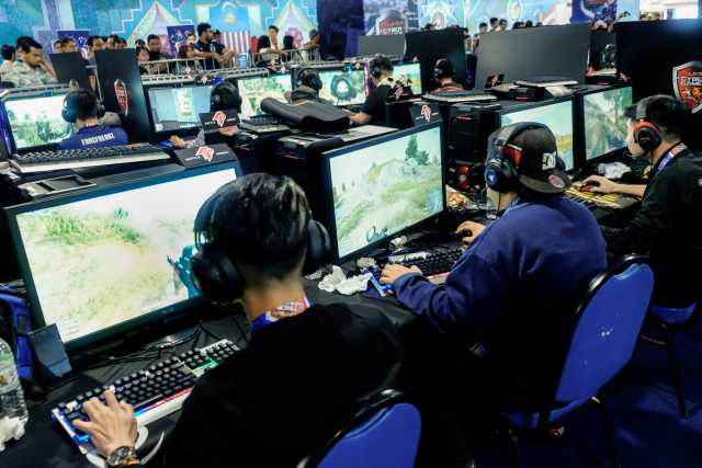 eSports players at a tournament, Asia
